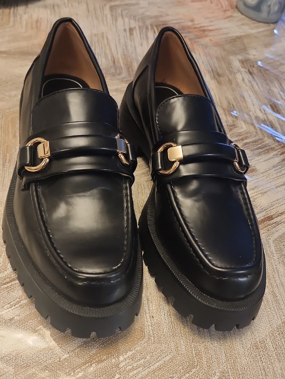 Men's Black Leather Lug-Sole Loafers with Gold Accent